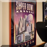 C15. Superbowl XXXVIII poster with game ticket. 